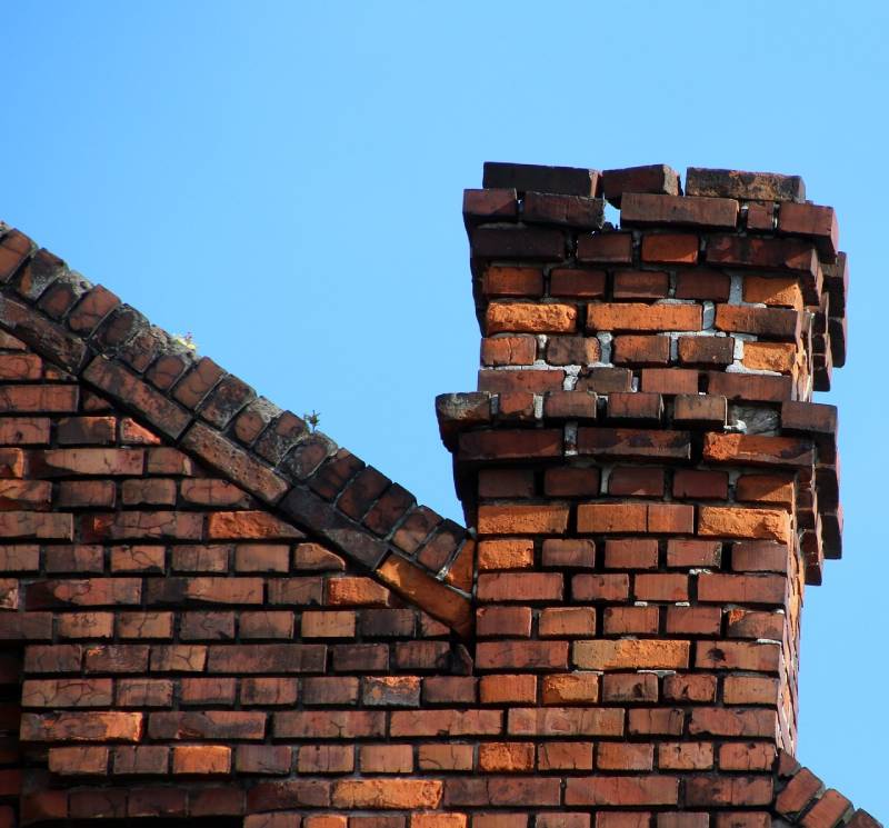 Signs Your Carson Home Needs a Chimney Inspection Damaged chimney on an Carson home showing cracks and missing mortar